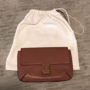 Like New Chloe rose leather clutch with gold hardware